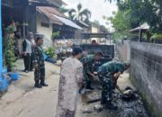 Babinsa Banyumulek Hadir Cepat Cegah Genangan Akibat Sampah Irigasi