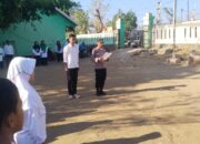 Police go to school, Bhabinkamtibmas Polsek Soromandi Jadi Irup Bendera di MIS Al-Mutmainah dan ini Pesannya